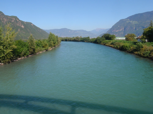 Crossing the Adige River from the west bank to the east bank.